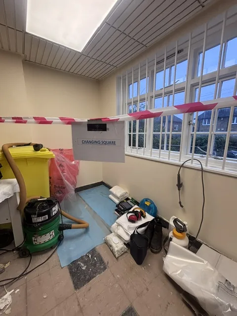 Asbestos floor tile and bitumen removal in Soho
